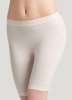 The Jockey® Skimmies Slipshorts help you conquer the day with comfortable coverage. This long-length, seamfree underwear style provides smoothing coverage and helps prevent panty lines. Silky-soft microfiber fabric creates a lightweight, sleek design without constriction. | Jockey® Skimmies Slipshorts in Light Beige, Size XL Seamless Mid-thigh Length Shapewear For Loungewear, Daywear Short Length Stretch Shapewear, Seamless 4-way Stretch Mid-thigh Shorts, White Stretch Short Length Shapewear, Seamless 4-way Stretch Mid-thigh Bottoms, White Stretch Shapewear For Loungewear, Mid-thigh Length Shorts For Daywear, Slip Shorts, Weights For Women