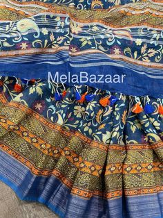 Beautiful floral print 100 count pure Linen Saree with a zari border ! Soft luxurious fabric, falls nicely and pleats easy ! Fall and tassels attached ! Blouse fabric included Color: Blue From Bihar,India Note: The color of the products may slightly vary according to the ambient lighting conditions and the color settings of LED devices. If you would like more clarity before your purchase, please drop us a message . Bohemian Slub Silk Saree With Block Print, Bohemian Block Print Slub Silk Saree, Bohemian Slub Silk Saree With Printed Motifs, Multicolor Tussar Silk Dupatta With Floral Print, Multicolor Floral Print Tussar Silk Dupatta, Festive Linen Saree With Pallu Detail, Blue Bohemian Tussar Silk Saree, Bohemian Multicolor Slub Silk Saree, Bohemian Blue Saree With Printed Border