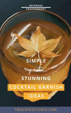 a glass filled with liquid and a leaf on the top that says, simple yet stunning cocktail