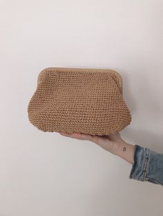 This straw bag is made with tan color paper rope. This raffia purse bag is made with crochet. It has hidden metal locked. It is big and lightweight. I made this straw boho clutch for women who want to look trendy and stylish. You can use it on your hand or under arm. The straw bag's measures; Width: 10 inches (25 cm) Height: 7 inches (18 cm) The inside of this straw clutch bag is ideally sized for daily or beach use. This straw bag with hidden metal locked is great gift for Christmas, birthday, Brown Clutch Straw Bag For Everyday Use, Everyday Handmade Brown Clutch, Eco-friendly Beige Pouch For Daily Use, Eco-friendly Daily Use Beige Pouch, Handmade Beige Tote Pouch, Handmade Beige Pouch For Daily Use, Handmade Beige Everyday Pouch, Beige Crochet Clutch Bag For Gift, Eco-friendly Brown Clutch Bag