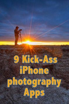 a person standing on top of a dirt hill with the sun setting in the background