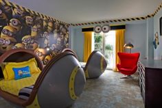 a bedroom with minions the movie character wallpaper and yellow drapes on the windows