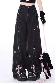 These black Gothic jeans are a must-have for anyone seeking an edgy, retro look. With a 90s aesthetic and Y2k vibe, they effortlessly blend vintage and Korean styles. The oversize fit adds a relaxed and comfortable element, perfect for those who want to make a statement while staying comfortable. Made from high-quality denim, these pants are durable and long-lasting, making them a great investment for any wardrobe. Their effortlessly cool and trashy vibe will elevate any outfit. Black High Waist Punk Jeans, Black Wide Leg Grunge Jeans, 90s Style Black Baggy Pants, 90s Style Baggy Black Pants, Black High Waist Y2k Jeans, Alternative Style Black Denim Jeans, Y2k Cotton Bottoms For Concert, Black Denim Punk Pants, Edgy Black Baggy Jeans