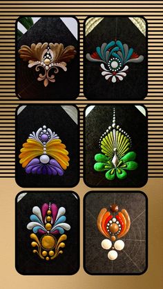 four different colored flowers on black and gold background