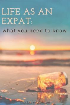 a bottle that is sitting on the sand near the ocean with words life as an expat what you need to know