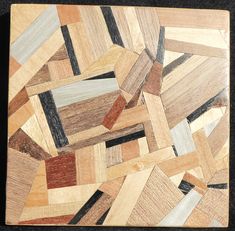 a wooden cutting board with many different types of wood