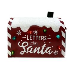 a red and white mailbox with letters to santa written on it