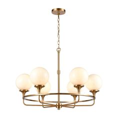 a brass chandelier with five white glass balls hanging from the bottom and four gold chains