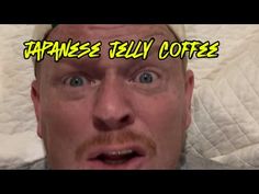 a man is making a face with the words japanese telly coffee on his forehead