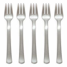 six silver forks and two knives on a white background