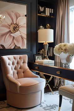 a chair sitting in front of a desk with a flower vase on top of it