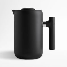 a black coffee pot with a handle is shown on a white background, it appears to be empty