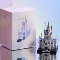 Transform Your Home Into A Fantasyland With This Detailed Model Of Cinderella Castle. Created In Celebration Of The 100th Anniversary Of The Walt Disney Company, The Magic Kingdom's Fairytale Landmark Includes A Little Tinker Bell Figure Amongst The Castle's Spires. Comes On An Elegant Black Base With A Walt Disney World Plaque. Detailed Cinderella Castle Model Includes Tinker Bell Figure On A Wire Includes Black Base Silvertone ''Walt Disney World'' Plaque Comes In Special Disney100 Presentatio Disney World Map, Castle Model, Walt Disney World Marathon, Castle Disney, Disney Cast, Disney 100, Mirrored Wallpaper, Cinderella Castle, Disney Trading Pins