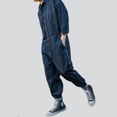 Bringing you the latest in city style from our 2023 Spring-Summer Collection. this navy men's denim overall is your ticket to classic fashion!Why You'll Love ItTailored for the fashion man with a flair for the classic. this denim overall promises to become a wardrobe staple. Its dark wash and baggy cut are perfectly complemented by its buttoned closure and unique smoothed finish. making it a classic traditional.Distinctive Features: Street Style: Make your mark on the modern scene with this deni Casual Relaxed Fit Denim Jumpsuit With Side Pockets, Casual Denim Jumpsuit With Side Pockets, Casual Dark Wash Denim Jumpsuit With Side Pockets, Relaxed Fit Dark Wash Denim Jumpsuit With Side Pockets, Casual Dark Wash Denim Jumpsuit, Casual Cotton Denim Jumpsuit For Streetwear, Casual Jumpsuits And Rompers With Relaxed Fit For Streetwear, Casual Navy Denim Jeans, Casual Navy Jumpsuits And Rompers With Pockets