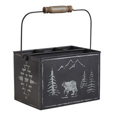 a black box with a bear and trees painted on it