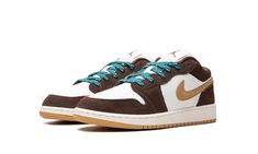 The Air Jordan 1 Low GS "Cacao Wow" is a youth sizing colorway of the retro basketball shoe with a versatile look.  The “Cacao Wow” Jordan 1 Low features a white leather base with Cacao Wow, or brown, suede overlays.  A tan suede Swoosh logo appears on the sides of the shoe and a tan “Wings” logo is embroidered on the heel.  Geode Teal-colored laces offer a punch of color against the shoe’s mostly neutral shades.  Release date: October 1, 2023 Retro Basketball Shoes, Jordan Model, Nike Air Jordan 1 Low, Wings Logo, Nike Air Jordans, Cocoa Brown, Nike Air Jordan 1, Air Jordan 1 Low, Kids Jordans