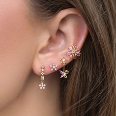 Delicate pink florals paired with fluttering butterflies add a touch of magic to your everyday look. You'll get lost in the stunning and calming baby pink hues of the cubic zirconia stones. Light Pink Jewelry Set, Pink Flower-shaped Cubic Zirconia Jewelry, Elegant Pink Cubic Zirconia Flower Earrings, Pink Cubic Zirconia Single Earring, Pink Jewelry With 3d Flowers For Party, Pink Feminine Flower Earrings, Pink Cubic Zirconia Flower-shaped Earrings, Pink Cubic Zirconia Flower Shaped Earrings, Elegant Pink Butterfly Charm Earrings