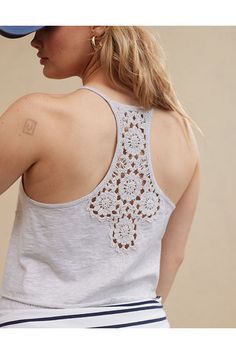 Ultra-soft & lightweight cotton fabric with the cutest crochet back deets/Scoop neck with oversized chest pocket/Racerback silhouette with back crochet panel/Raw hem deets!/Accessibility deets: tagless label to minimize irritation & maximize comfort! Cotton Crochet Lace Tank Top For Spring, Cotton Lace Trim Tank Top For Vacation, Bohemian Cotton Tops With Crochet Lace, Casual Cotton Crochet Top With Crochet Trim, Bohemian Cotton Tops With Crochet Trim, Casual Cotton Tank Top With Crochet Lace, Crochet Cotton Tank Top, Cotton Crochet Tank Top, Cotton Crew Neck Top With Crochet Trim