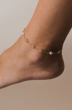 This slim chain-link anklet grounds your ensembles in subtle shine. 9 3/4" length; 2" extender Imitation-pearl size: 5.5–6mm Sterling silver or sterling silver with 14k-gold plate/plastic/cubic zirconia Imported Elegant Metal Anklet With Adjustable Chain, Elegant Silver Anklets With Pearl Chain, Pearl Chain Anklet For Party, Elegant Anklets With Extender, Elegant Metal Anklets With Ankle Strap, Delicate Pearl Chain Anklets, Elegant Adjustable Metal Anklets, Elegant Pearl Chain Anklet For Party, Elegant Pearl Chain Anklets For Wedding