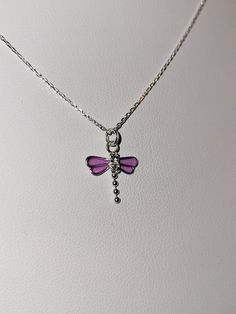 This handmade "Annabelle" design is made with beautiful clear & purple enamel and crystals forming an elegant dragonfly on a 18-20" adjustable Gossamer Diamond Cut 1mm Sterling Silver necklace. This beautiful necklace brings out the transformation, realization, creative imagination, and insight of clear vision dragonflies can represent. This sparkling crystal dragonfly necklace looks great on the job, every day, or out on the town. Each piece has a beautiful design name, inspired to bring out th Purple Dragonfly, Creative Imagination, Unique Gift Items, Dragonfly Necklace, Handmade Fine Jewelry, Dope Jewelry, Clear Vision, Elegant Gifts, Funky Jewelry