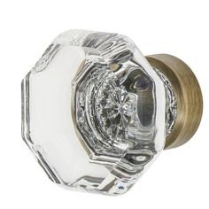 an antique style glass door knob on a white background