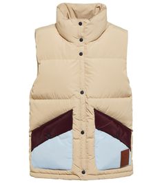 This vest from Tory Sport is an athletic transseasonal essential. Backed with pillowy down for optimum insulation, this water-repellent design has slanted colorblocked pocket, one of which features a logo-embossed leather patch. | Tory Sport Colorblocked down vest Sport Online, Sports Vest, Outerwear Vest, Suit Vest, Down Vest, Knit Vest, Outerwear Women, Sweater Vest, Womens Vest