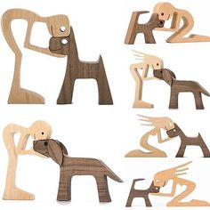 wooden cutouts of different shapes and sizes of dogs