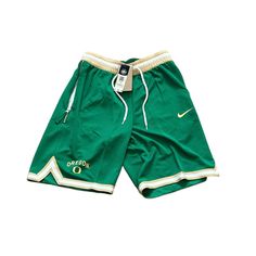 Brand New With Tags Officially Licensed Oregon Ducks Nike Men’s Dri Fit Athletic Shorts. 100% Polyester. 2 Side Pockets. Green Nike Cotton Pants, Nike Green Cotton Bottoms, Green Short Sports Pants, Oregon Ducks, Shorts Athletic, Nike Shorts, Athletic Shorts, Men's Nike, Mens Bottom