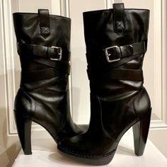 Elevate Your Fashion Game With These Stylish Women's Michael Kors Lisa Boots. Crafted From Premium Quality Black Leather, These Mid-Calf Booties Feature Almond Toes, Block Heels, Studded Accents, And Logo Detailing That Add A Touch Of Designer Style To Your Look. They Are Perfect For Casual Or Business Occasions. Leather Upper Leather Sole 4.5” Heel In Great Preowned Condition With Signs Of Normal Wear From Used Such As Minor Scratches On Leather, Light Scratches At Heels, Wear At Outsoles. Overall They’re In Great Condition. Closed Toe Platform Boots For Workwear, Leather Heeled Boots With 4-inch Heel For Winter, Chic High Heel Moto Boots Medium Width, Chic Leather Mid-calf Boots With Round Toe, Fall High-heel Leather Moto Boots, High Heel Leather Moto Boots For Fall, Leather Moto Boots With High Heel For Fall, Chic Moto Boots With Pointed Toe, Chic Leather High Heel Moto Boots