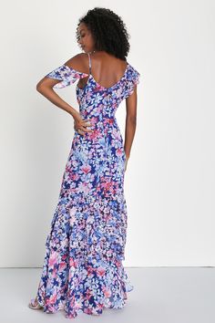 Twirl all of your problems away in the Lulus Radiant Blue Floral Print Chiffon Maxi Dress! Blue chiffon, with a pink, blue, and white floral print, constructs this beautiful asymmetrical maxi dress with a V-neckline and darted bodice. An empire waist and faux wrap bodice are supported by a thick tank strap and a cold shoulder, with an adjustable strap, that are both sweetly accented by ruffle details that carry into the pretty maxi skirt with a tiered ruffle hem. Hidden clasp/zipper at back. Fit Blue Floral Print Chiffon Maxi Dress, Blue Floral Print Floor-length Dress, Spring Floor-length Maxi Dress With Vibrant Print, Floral Print Chiffon Maxi Dress, Multicolor Floral Print A-line Maxi Dress, Summer Blue Floral Print Maternity Dress, Blue Floral Print Maternity Maxi Dress, Asymmetrical Maxi Dress, Print Chiffon Maxi Dress