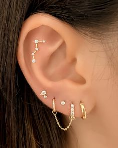 Details: Material: 14k white solid gold Hypoallergenic and Nickel-Free Stone: AAA-grade cubic zirconia Thickness: 20G (0.8mm) Inner diameter: 5mm, 6mm, or 8mm Closing mechanism: Clicker Sold as a single earring Huggie Earring, White Solid, Huggie Earrings, Single Earring, Huggies Earrings, Solid Gold, Cubic Zirconia, White Gold, Crystals