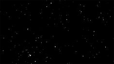 the night sky is black and white with stars all over it, as well as some snow flakes