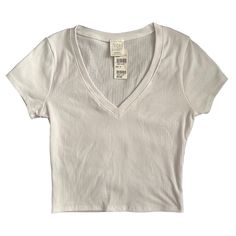 Tillys/Rsq V-Neck Rib Women’s Tee: White. Waited Too Long To Return It And Lost The Receipt. Length: 17 In. Bust: 13 In. Sleeve Length: 5 In. Basic V-neck Crop Top For Spring, Spring Basic V-neck Crop Top, Casual Fitted White V-neck Top, White Short Sleeve Emo Tops, Solid V-neck Y2k Tops, Cheap V-neck Cropped T-shirt, White Y2k Short Sleeve Crop Top, White Fitted Y2k Cropped T-shirt, 2024 Clothes