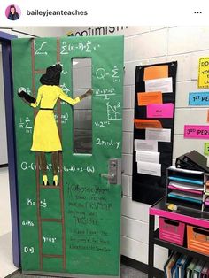 a classroom door decorated with an image of a woman climbing the ladder to solve problems