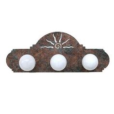 an iron and glass wall light with three lights on it's side, in the shape of a cloud