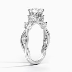 a white gold ring with diamonds on it