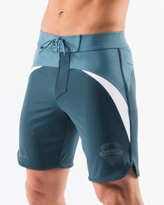 HIGHLIGHTS.. Unlined boardshort. 9” inseam Reflective branding at leg opening and back waistband Elastic waistband with adjustable self-tie drawcords Color-blocking panelling Water resistant fabric FIT SUGGESTION. This item runs true to Alphalete’s standard sizing.. Fit is based off of waist size in inches.. If you are between sizes, we recommend sizing up for a relaxed fit.. Eric is 6’2”/188cm, wearing a size 32. MATERIALS AND WASHING DIRECTIONS. 67% Nylon, 23% spandex. Due to the high saturati Sporty Blue Bottoms With Contoured Waistband, Athleisure Blue Shorts With Contoured Waistband, Blue Athleisure Shorts With Contoured Waistband, Sporty Blue Shorts With Contoured Waistband, Blue Nylon Bottoms With Contoured Waistband, Blue Workout Bottoms With Elastic Side Panels, Blue Training Bottoms, Athleisure Blue Athletic Shorts With Functional Drawstring, Blue Athletic Shorts With Functional Drawstring