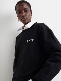 Women's Tops T-shirts & Hoodies | Off-White™Official Black Logo Sweatshirt For Spring, Black Sweatshirt With Logo Detail For Spring, Black Cotton Sweater With Logo Detail, Black Logo Sweater For Streetwear, Black Sweater With Logo For Streetwear, Black Logo Sweatshirt For Fall, Black Crew Sweatshirt With Logo, Oversized Black Sweatshirt With Logo Detail, Classic Black Sweater With Logo Print