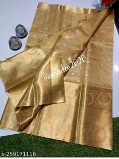 DISCRIPTION Tissue Saree Banarasi Silk Saree With Big Kanchi Border Saree Wedding Wear Girlish Bridal Sari Gift Indian Saree Festive Wear Running Blouse pattu saree.  PRODUCT DETAILS Auction For: 1 Saree with Blouse Piece Color: As shown in the picture Condition: New Work: zari border Saree fabric : Kota silk Saree length : 5.5 meters Blouse length : 0.8 meters Washing Instructions: Dry Clean Only Occasions: Wedding Wear, Party Wear, Festive Wear, Durga Puja, Indian Wear, Sangeet Wear, Bridal Wear, Chrismas Day, Mothers Day, Haldi Wear. Fall and Pico: On request (Please contact for fall and piku work) Blouse stitching: Available for an additional cost. (Please contact for Blouse Stitching Work) Petticoat: Available for an additional cost. Please contact for Petticoat) NOTE *Actual color ma Gold Embroidered Raw Silk Fabric For Wedding, Festive Lehenga With Zari Work For Marriage, Festival Marriage Lehenga With Zari Work, Tissue Silk Blouse Piece For Wedding During Diwali, Gold Organza Blouse Piece For Eid, Gold Raw Silk Traditional Wear For Wedding, Gold Embroidered Art Silk Fabric For Celebration, Festival Lehenga With Pallu For Marriage, Gold Art Silk Embroidered Fabric For Celebration