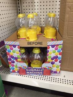 the gumball machine has been set up for sale in the store, and it's yellow