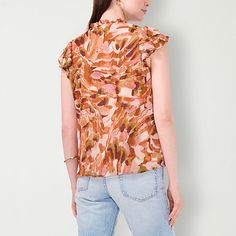 Bring a feminine touch to your casual wardrobe with this Sam And Jess women's blouse featuring an artistic abstract print in warm tones. It's crafted from lightweight chiffon for an airy feel and is cut for a regular-fit with a split tie neck and short flutter sleeves. Wear it with jeans and wedges for a chic look.Closure Type: Tie, Pullover HeadFit: Regular FitNeckline: Split Tie NeckSleeve Length: Short SleeveSleeve Style: Flutter SleeveApparel Length: 24.25 InchesFiber Content: 100% Polyeste… Casual Tops With All Over Print For Work, Casual All Over Print Tops For Work, Trendy Fitted Top With Abstract Print, Multicolor Fashion Print Top For Fall, Spring Short Sleeve Blouse With Abstract Print, Chic Spring Tops With All Over Print, Chic All Over Print Tops For Spring, Chic All Over Print Spring Tops, Chic Spring All Over Print Tops