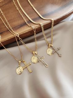 18k Gold Cross Necklace, Cross Necklace, Christian Gifts, Virgin Mary Minimalist Necklace, Baptism necklace, Christmas Gift, Women Gift Select your favorite chain! This set comes with your a pretty cross charm of your choice and a Virgin Mary that makes for a timeless jewelry piece ! <3 ♥ MATERIAL: - Material: 18K Gold filled - Nickel free hypoallergenic for sensitive skin - Lightweight, perfect for everyday wear ♥ SHIPPING  All orders will be shipped out within 1 business days after the order has been received. Orders shipped to the US take 2-4 business days to arrive. Canadian orders take about 7-14 business days to arrive. All other international orders take 7-21 business days to arrive.  ♥ GIFTS If you would like us to send the jewelry directly to the recipient, all you need to do is t Crucifix Charm Necklace As Gift, Crucifix Charm Necklace For Gift, Gold Cross Pendant Necklace For Baptism, Gold Cross Pendant Necklace For First Communion, Gold Crucifix Necklace For Baptism, Gold Pendant Necklace For First Communion, Gold Pendant Necklace For Baptism, Personalized Gold Necklaces For Baptism, Personalized Gold Necklace For Baptism