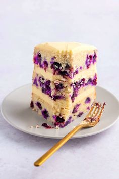 three pieces of cake on a plate with a fork