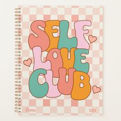 a spiral notebook with the words sale love club written in multicolored letters on it