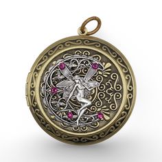 Beautiful large fairy locket necklace for those who love fantasy jewelry. Let this pretty little sterling silver plated fairy guard over your most precious memories while perched atop a crescent moon. This piece features Swarovski crystals and a large bronze toned Victorian styled locket. The locket measures 46mm (approximately 2") in diameter and it comes with a chain in the length of your choice. Tip: If you are unsure what necklace length you need, then you should use a piece of string or rib