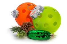 three christmas balls and two pine cones on a white background stock images, royalty photos