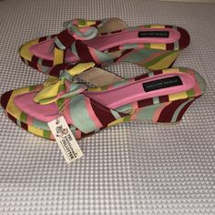 Mellow World Striped Sandals With Clip On Removable Bow Sz 8 Adorable. Wedge Heel. Colorful And Fun Pattern: Pink Light Blue Green Yellow And Burgundy Stripe. Denim/Cloth. Soft Foot Bed. Tag Says 7 But Soles Are Stamped Size 8. Some Dye Transfers/Imperfections. Priced Accordingly. See Photos. New, Never Worn. Retro Pink Sandals For Summer, Pink Retro Sandals For Summer, Retro Wedge Sandals For Beach, Multicolor Fabric Open Toe Heels, Retro Multicolor Open Toe Sandals, Retro Multicolor Sandals For The Beach, Retro Beach Wedge Sandals For Spring, Yellow Beach Wedge Sandals With Cushioned Footbed, Retro Wedge Sandals For Beach In Spring