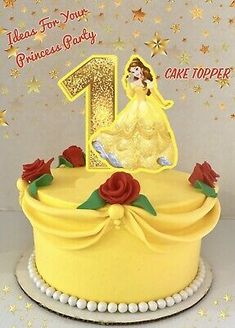 a yellow princess cake with the number one on it's top and stars in the background