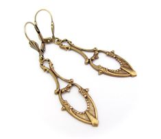 "Art Nouveau Earrings Antiqued golden brass Earrings. Fabulous long dangle Art Nouveau design earrings. Antiqued Brass, nickel free. Measure 2-1/4\" top to bottom. I am happy to switch to french ear wires or clip on if you prefer. Lever back design may vary. Dramatic Beauty...these can be worn every day to Wedding day! Sent to you with Aloha! More of my Artisan Jewelry: hawaiibeads.etsy.com" Antique Gold Chandelier Earrings In Brass, Victorian Gold Chandelier Earrings In Brass, Gold Art Nouveau Earrings For Weddings, Art Nouveau Gold Wedding Earrings, Art Nouveau Gold Earrings For Wedding, Formal Brass Dangle Chandelier Earrings, Bronze Drop Earrings For Wedding, Bronze Wedding Drop Earrings, Brass Plug Earrings For Wedding