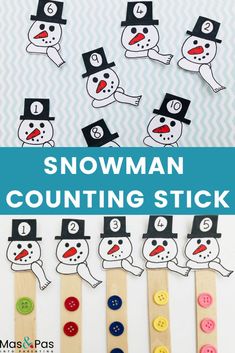 a snowman counting stick with buttons on it